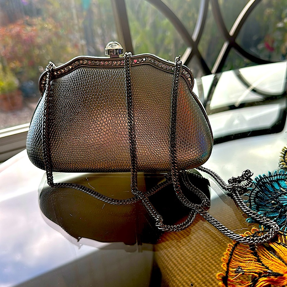 Ladies evening clutch purse silver with crystal edges. 6 “ x 4”